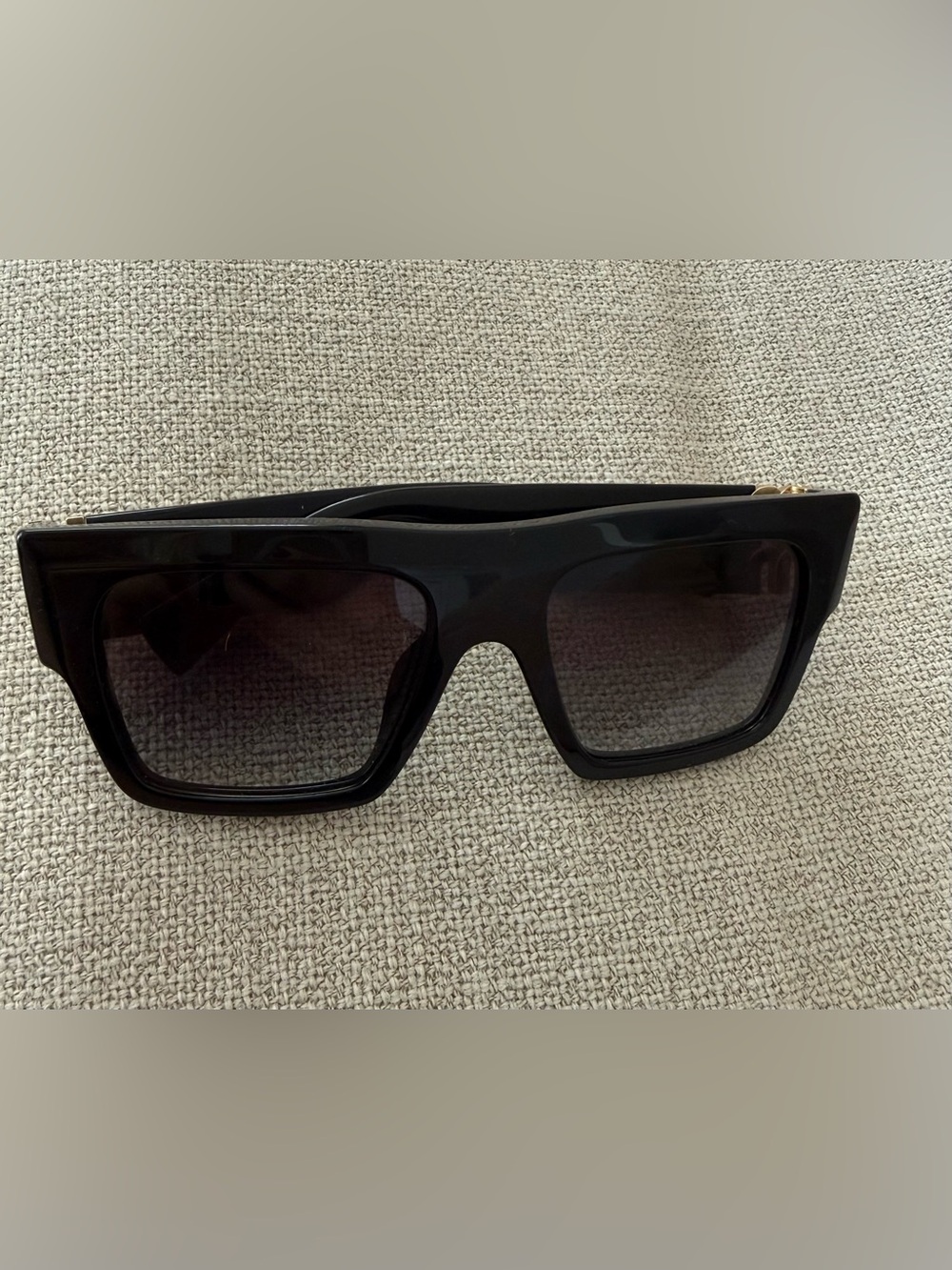 Miu Miu Black Sunglasses with Gold Logo Accent